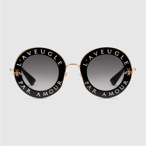 round frame Gucci sunglasses